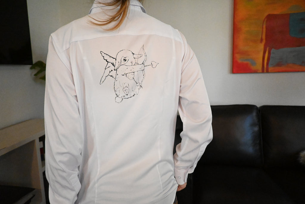 A white button up with a bunny design.